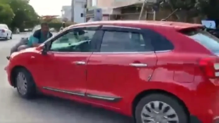 Man dragged on car bonnet